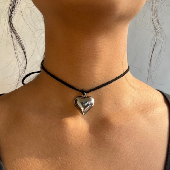 Puffed heart pendant on a long black wrap around cord necklace. - Picture 4 of 4